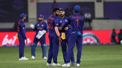 Indian cricket captain Virat Kohli, second right, talks to teammates during the last few overs of the game against Pakistan. (AP) Indian cricket captain Virat Kohli, second right, talks to teammates during the last few overs of the game against Pakistan. (AP)
