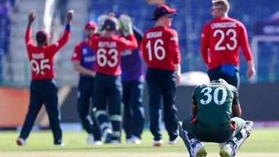 Bangladesh's captain Mohammad Mahmudullah reacts following the run out of teammate Afif Hossain during the Cricket Twenty20 World Cup match between England and Bangladesh in Abu Dhabi, UAE, Wednesday, Oct. 27, 2021. (AP Photo/Aijaz Rahi) (AP) Bangladesh's captain Mohammad Mahmudullah reacts following the run out of teammate Afif Hossain during the Cricket Twenty20 World Cup match between England and Bangladesh in Abu Dhabi, UAE, Wednesday, Oct. 27, 2021. (AP Photo/Aijaz Rahi) (AP)