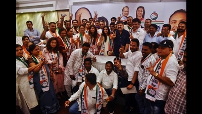 The corporators, who joined NCP from BJP (Ulhasnagar) with the Housing Minister, Jitendra Awhad, in Thane on Wednesday. (PRAFUL GANGURDE/HT PHOTO) The corporators, who joined NCP from BJP (Ulhasnagar) with the Housing Minister, Jitendra Awhad, in Thane on Wednesday. (PRAFUL GANGURDE/HT PHOTO)