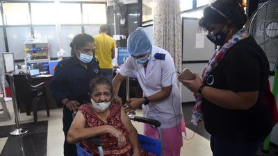 A beneficiary gets inoculated against Covid-19 at Bharatratna Dr. Babasaheb Ambedkar Municipal General Hospital, Kandivali. Maharashtra on Wednesday recorded 1,485 new cases with 38 deaths. (HT PHOTO) A beneficiary gets inoculated against Covid-19 at Bharatratna Dr. Babasaheb Ambedkar Municipal General Hospital, Kandivali. Maharashtra on Wednesday recorded 1,485 new cases with 38 deaths. (HT PHOTO)