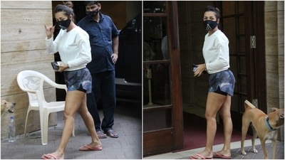 Flaunting her enviable frame, Malaika teamed the jumper with her favourite pair of galaxy print shorts. The unique bottoms are Malaika's go-to look, whether she is going to the gym or running errands in the city. (HT Photo/Varinder Chawla) Flaunting her enviable frame, Malaika teamed the jumper with her favourite pair of galaxy print shorts. The unique bottoms are Malaika's go-to look, whether she is going to the gym or running errands in the city. (HT Photo/Varinder Chawla)