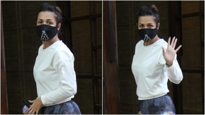 Malaika Arora was snapped outside her building in Mumbai today. The paparazzi clicked the star playing with her four-legged friend Coco. (HT Photo/Varinder Chawla) Malaika Arora was snapped outside her building in Mumbai today. The paparazzi clicked the star playing with her four-legged friend Coco. (HT Photo/Varinder Chawla)