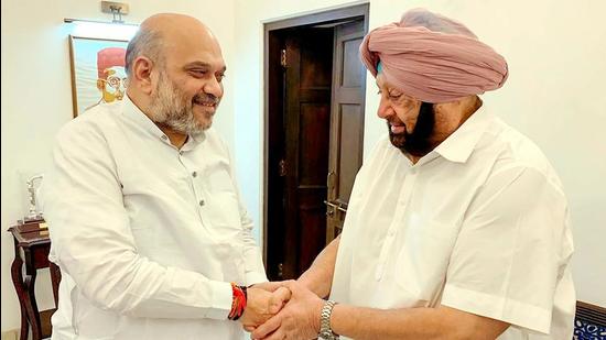 Union home minister Amit Shah with former chief minister Capt Amarinder Singh during a meeting in New Delhi recently. (HT file photo)