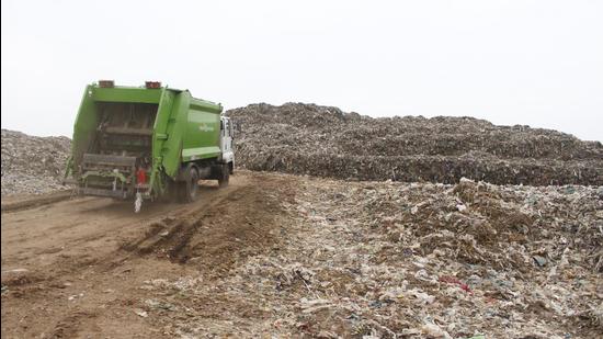 Around 2.5 million tonnes of legacy waste is estimated to be lying at the Bandhwari landfill, which receives around 1,900 tonnes of fresh waste daily from Gurugram and Faridabad. (HT Archive)