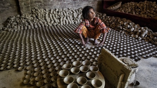 As Diwali approaches, potters in different parts of India are gearing up to increase the production of earthen lamps.(HT Photo/Deepak Gupta)