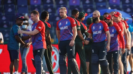 England's Eoin Morgan and teammates celebrate after the match as they shake hands with Bangladesh players.(REUTERS)