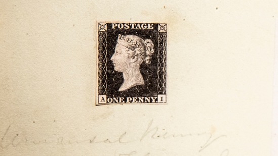 The world's first postage stamp, the Penny Black, is displayed at Sotheby's(AFP)