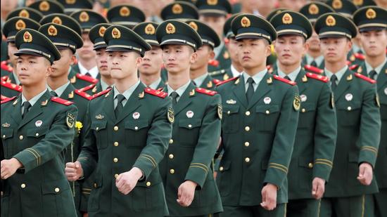 A file photo of China’s PLA soldiers at a march in Beijing. India has urged China to not take any actions under a new border law. (REUTERS/File)