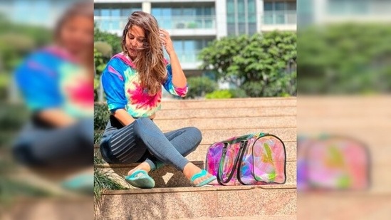 Hina Khan opted for this stylish yet comfy tie-dye cropped hoodie which she teamed with tights and blue flip flops.(Instagram/@realhinakhan)