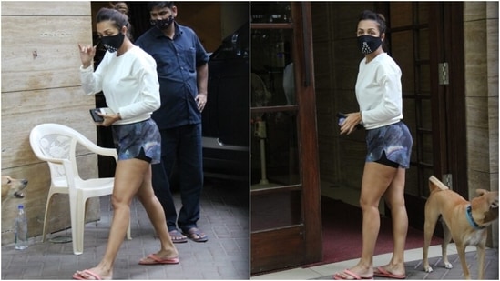 Flaunting her enviable frame, Malaika teamed the jumper with her favourite pair of galaxy print shorts. The unique bottoms are Malaika's go-to look, whether she is going to the gym or running errands in the city.(HT Photo/Varinder Chawla)