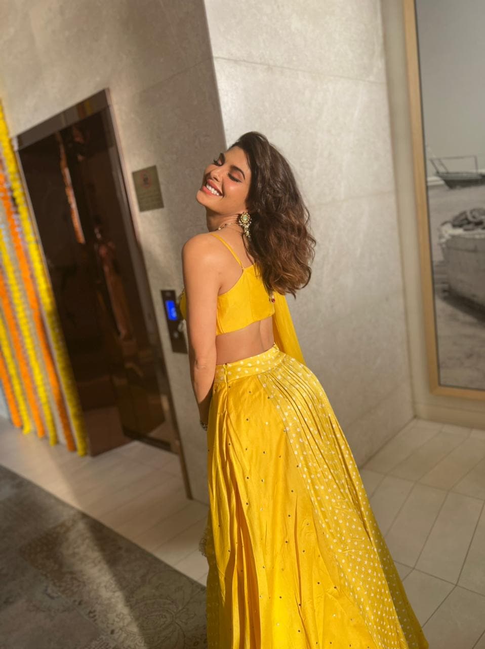 Jacqueline Fernandez in yellow lehenga set(Amigos Communications)