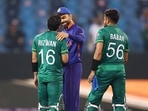 India's captain Virat Kohli congratulates his Pakistan's counterparts Babar Azam and Mohammad Rizwan following their victory.(ANI) India's captain Virat Kohli congratulates his Pakistan's counterparts Babar Azam and Mohammad Rizwan following their victory.(ANI)