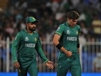 Pakistan's Shaheen Afridi, right, listen to captain Babar Azam(AP) Pakistan's Shaheen Afridi, right, listen to captain Babar Azam(AP)