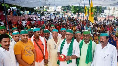 Farmers in Varanasi carry ashes of protesters killed in the Lakhimpur Kheri violence. District magistrate Arvind Kumar Chaurasiya was transferred over his handling of the case. (PTI/File)