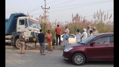 People gather at the truck accident site in Bahadurgarh on Thursday morning. Three women protesters from Mansa were killed and two others were injured in the mishap. (Manoj Dhaka/HT) People gather at the truck accident site in Bahadurgarh on Thursday morning. Three women protesters from Mansa were killed and two others were injured in the mishap. (Manoj Dhaka/HT)
