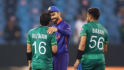 India's captain Virat Kohli congratulates his Pakistan's counterparts Babar Azam and Mohammad Rizwan following their victory. (ANI)