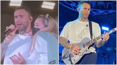 Adam Levine was hugged by a girl at the Maroon 5 concert. Adam Levine was hugged by a girl at the Maroon 5 concert.