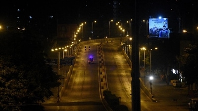Deserted street during night curfew in Surat. (ANI ) Deserted street during night curfew in Surat. (ANI )