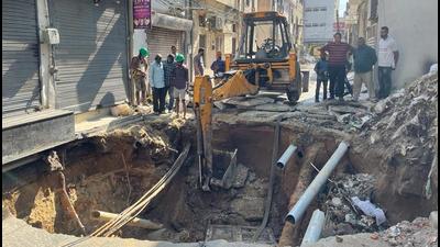 CCTV footage of the incident, which has been widely circulated on social media, shows the road cave in took place just after a school bus crossed Deep Nagar area in Ludhiana around 8am. (Gurpreet Singh/HT) CCTV footage of the incident, which has been widely circulated on social media, shows the road cave in took place just after a school bus crossed Deep Nagar area in Ludhiana around 8am. (Gurpreet Singh/HT)
