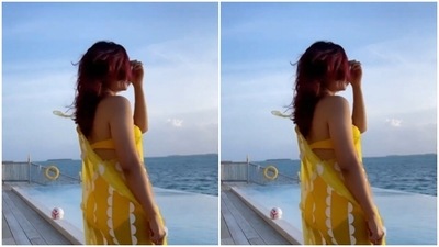 Tahira, in a yellow bikini, let her hair play to the tunes of the wind in Maldives. (Instagram/@tahirakashyap) Tahira, in a yellow bikini, let her hair play to the tunes of the wind in Maldives. (Instagram/@tahirakashyap)