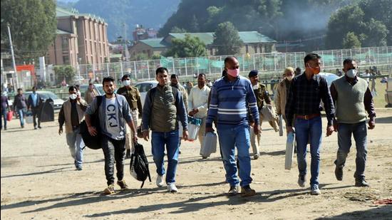 Officials reach polling stations for upcoming bypoll to Mandi Lok Sabha seat on Thursday. (Birbal Sharma/HT)