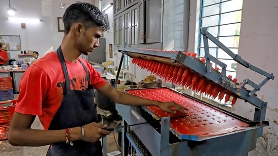 In Delhi, workshops have been organised where the visually impaired people are working hard and making diyas and candles.(ANI)