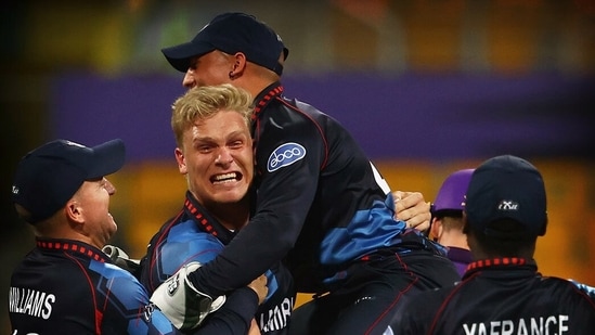 UAE, Oct 27 (ANI): Ruben Trumpelmann of Namibia celebrates the wicket of Richard Berrington of Scotland during the ICC mens Twenty20 World Cup cricket match between Scotland and Namibia at the Sheikh Zayed Cricket Stadium in Abu Dhabi on Wednesday. (ANI Photo)(ANI)