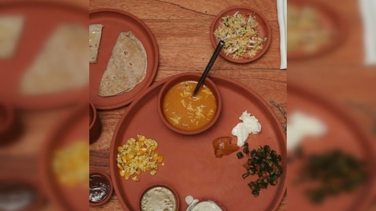 Milind Soman and Ankita Konwar experience "the Sattvik principles" for the first time as they indulge in delicious Sattvic food.(Instagram/@milindrunning)