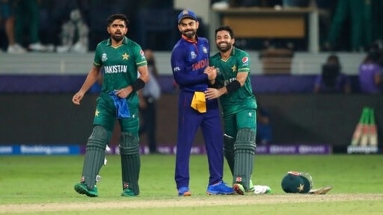 Team India skipper Virat Kohli shares a hug with Pakistan wicketkeeper-batter Mohammad Rizwan.&nbsp;(AP)