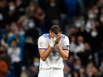 Real Madrid's Karim Benzema reacts during a Spanish La Liga soccer match between Real Madrid and Osasuna at the Santiago Bernabeu stadium in Madrid, Spain, Wednesday Oct. 27, 2021. (AP Photo/Jose Breton)