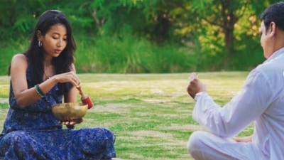 Ankita Konwar and Milind Soman are taking part in alternative healing and inner well-being amidst the woods. (Instagram/@ankita_earthy)