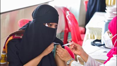 A beneficiary receives a dose of Covid vaccine in Bengaluru. Karnataka reported 381 fresh Covid cases and seven deaths on Friday. (PTI)