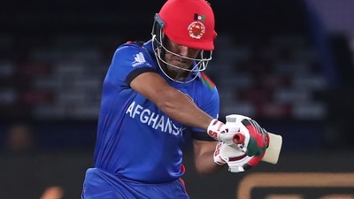Afghanistan's Najibullah Zadran bats during the Cricket Twenty20 World Cup match between Pakistan and Afghanistan in Dubai, UAE, Friday, Oct. 29, 2021. (AP Photo/Aijaz Rahi) (AP)