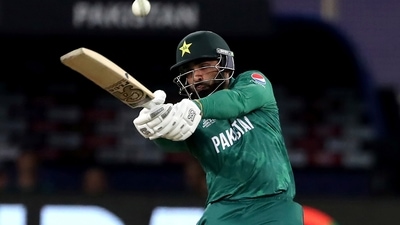 Pakistan's Asif Ali hits a six during the Cricket Twenty20 World Cup match between Pakistan and Afghanistan in Dubai, UAE, Friday, Oct. 29, 2021. (AP Photo/Aijaz Rahi) (AP)
