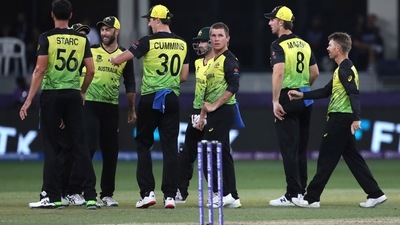 Australia's Adam Zampa,third right, celebrates the dismissal of Sri Lanka's Avishka Fernando with his teammates during the Cricket Twenty20 World Cup match between Australia and Sri Lanka in Dubai, UAE, Thursday, Oct. 28, 2021. (AP) Australia's Adam Zampa,third right, celebrates the dismissal of Sri Lanka's Avishka Fernando with his teammates during the Cricket Twenty20 World Cup match between Australia and Sri Lanka in Dubai, UAE, Thursday, Oct. 28, 2021. (AP)