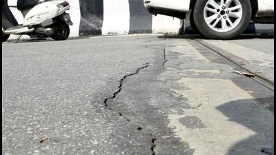 Cracks visible on a road at the farmer protest site in Ghazipur border near Ghaziabad on Friday. (Sakib Ali/HT photo) Cracks visible on a road at the farmer protest site in Ghazipur border near Ghaziabad on Friday. (Sakib Ali/HT photo)