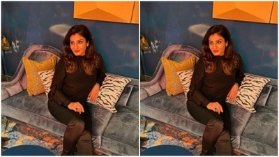 Raveena teamed a satin black top with a pair of silk black trousers. (Instagram/@officialraveenatandon) Raveena teamed a satin black top with a pair of silk black trousers. (Instagram/@officialraveenatandon)