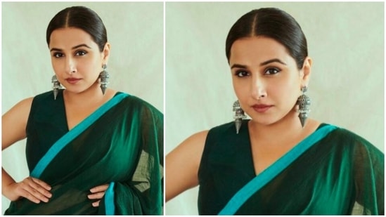 With her hair middle-parted and tied in a low back bun, Vidya Balan posed for the camera.(Instagram/@balanvidya)