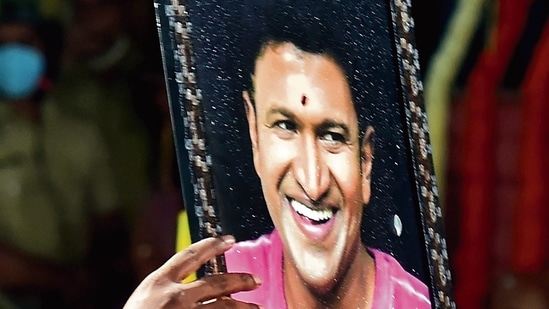 Over the next four decades, Puneeth Rajkumar built a stellar career with blockbuster hits and a cult following in Karnataka for his action sequences and fitness regimen. (PTI)