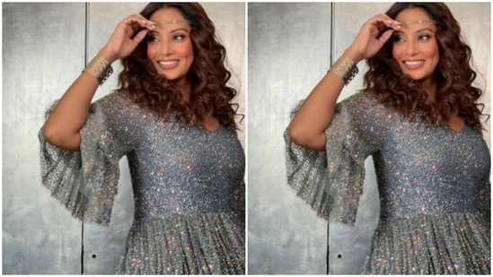 Bipasha decked up in a blue and silver embellished dress with handwoven glitters.(Instagram/@bipashabasu)