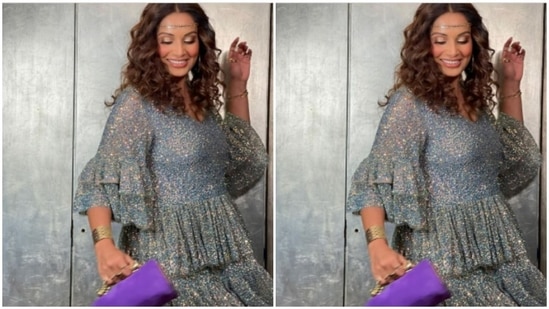 In gold eyeshadow and nude lipstick, Bipasha added a small blue pouch to her look and was perfectly ready for Halloween.(Instagram/@bipashabasu)
