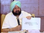 Former Punjab chief minister Amarinder Singh addresses a press conference, in Chandigarh on Wednesday.(ANI Photo)