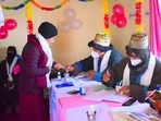 Election official marking ink on the finger of a voter during the Mandi Lok Sabha bypoll at the world's highest polling station at Tashigang in Lahaul-Spiti district on Saturday. (ANI Photo)(Ajay Kumar) Election official marking ink on the finger of a voter during the Mandi Lok Sabha bypoll at the world's highest polling station at Tashigang in Lahaul-Spiti district on Saturday. (ANI Photo)(Ajay Kumar)