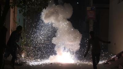 Gurugram, India-November 14: People bursting firecrackers in the streets during Diwali at Sector-11 near Khandsa Road, in Gurugram, India, on Saturday, November 14, 2020. (Photo by Parveen Kumar/Hindustan Times) Gurugram, India-November 14: People bursting firecrackers in the streets during Diwali at Sector-11 near Khandsa Road, in Gurugram, India, on Saturday, November 14, 2020. (Photo by Parveen Kumar/Hindustan Times)