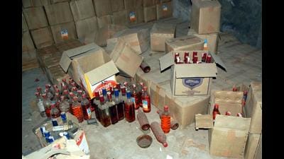 Chandigarh Police arrested the man with 16 bottles of English wine and five quarters of country-made liquor from his possession. (Representative image) Chandigarh Police arrested the man with 16 bottles of English wine and five quarters of country-made liquor from his possession. (Representative image)