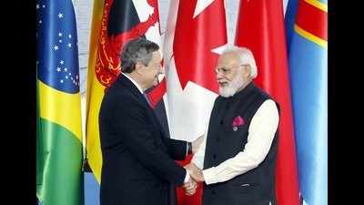Prime Minister Narendra Modi exchanges greetings with Italian Prime Minister Mario Draghi during the G-20 Summit, at the Rome Convention Centre, in Rome on Saturday. (ANI) Prime Minister Narendra Modi exchanges greetings with Italian Prime Minister Mario Draghi during the G-20 Summit, at the Rome Convention Centre, in Rome on Saturday. (ANI)