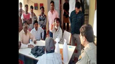 MLA Raniganj, Dheeraj Ojha, at Fatanpur police station of Pratapgarh. The MLA alleged that the raid at liquor shop and the recovery of rectified spirit recovered were fake and demanded a fair probe. (HT photo) MLA Raniganj, Dheeraj Ojha, at Fatanpur police station of Pratapgarh. The MLA alleged that the raid at liquor shop and the recovery of rectified spirit recovered were fake and demanded a fair probe. (HT photo)