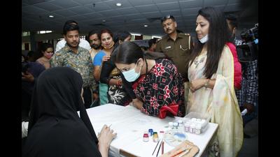 Union minister Smriti Irani, who launched the ‘Hello Kamal Shakti’ app, interacts with women at a function in Lucknow on Saturday. (Sourced)