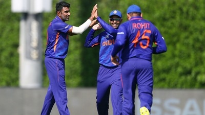 Ravichandran Ashwin of India celebrates the wicket of David Warner of Australia during the India and Australia warm Up Match prior to the ICC Men's T20 World Cup at ICC Academy Ground in Dubai on Wednesday. (ANI) Ravichandran Ashwin of India celebrates the wicket of David Warner of Australia during the India and Australia warm Up Match prior to the ICC Men's T20 World Cup at ICC Academy Ground in Dubai on Wednesday. (ANI)