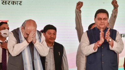 Union home minister Amit Shah with Uttarakhand chief minister Pushkar Singh Dhami during the launch of 'Ghasyari Kalyan Yojana', in Dehradun on Saturday. (PTI Photo) Union home minister Amit Shah with Uttarakhand chief minister Pushkar Singh Dhami during the launch of 'Ghasyari Kalyan Yojana', in Dehradun on Saturday. (PTI Photo)